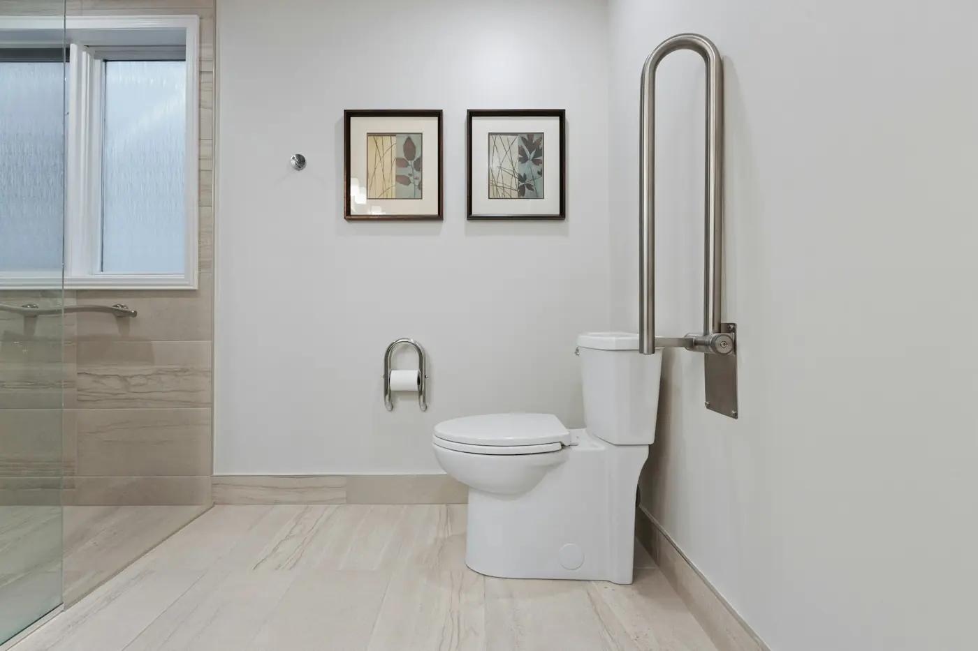 An accessible bathroom with a roll-in shower and grab bars